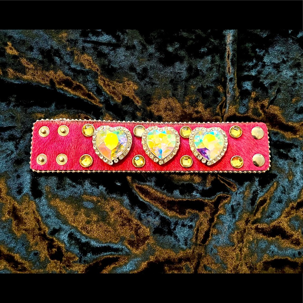 Pink calf hair leather bracelet with crystal hearts.